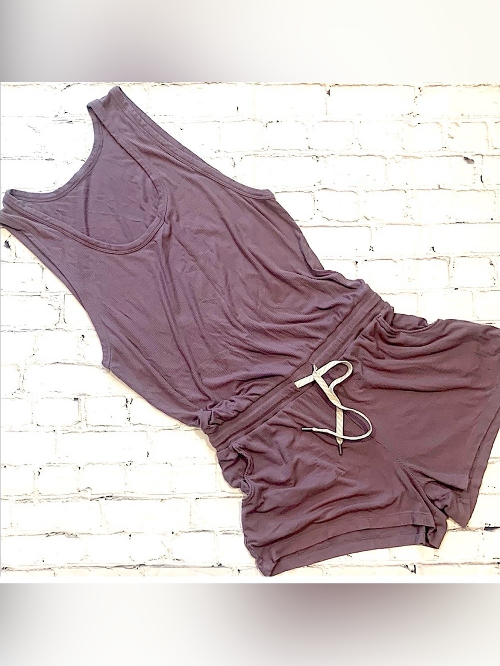 Vuori Ribbed Dusky Mauve Sleeveless Romper with Drawstring Waist